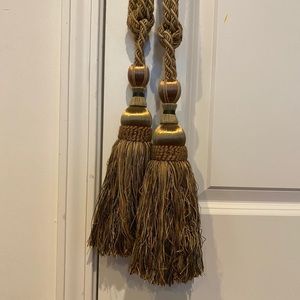 Front gate gold tassels